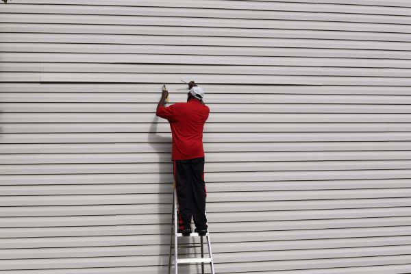 Loose Siding Repair in Dover